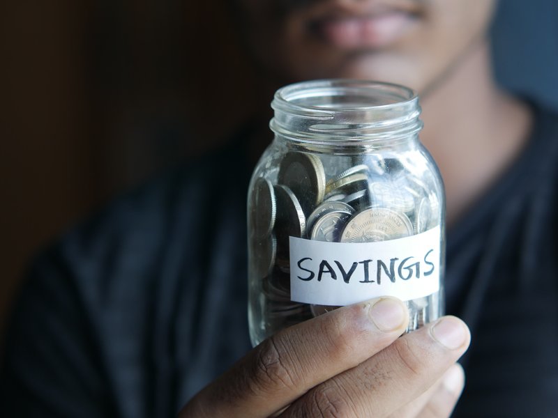 Five money tips for young adults to secure financial freedom.
