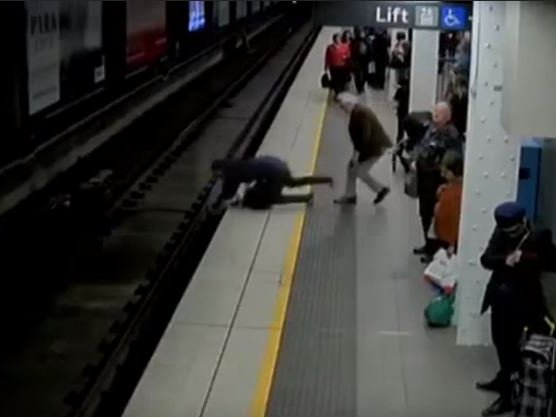Man falls onto train tracks