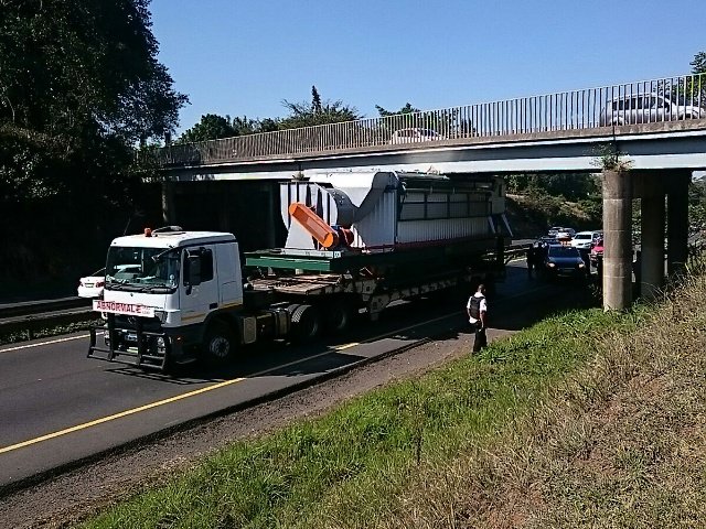 Truck stuck under M13 bridge