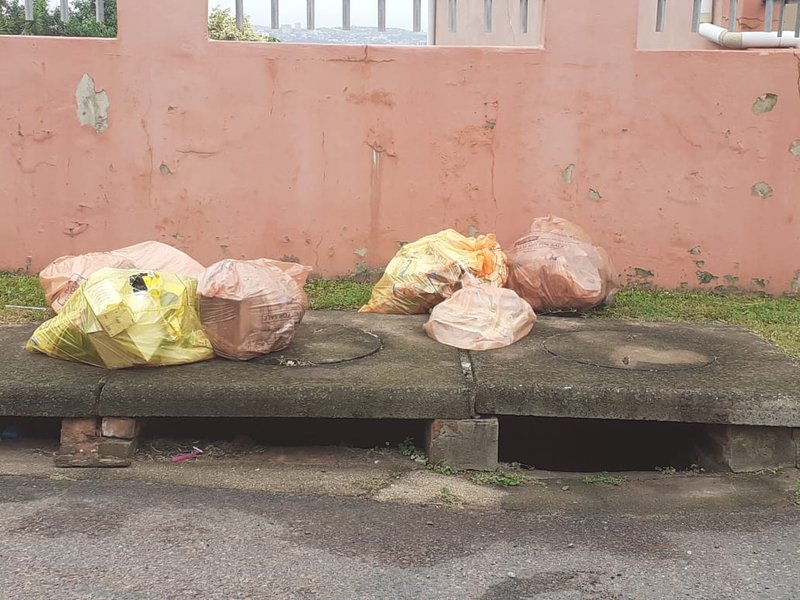 uncollected recycling refuse bags in bluff
