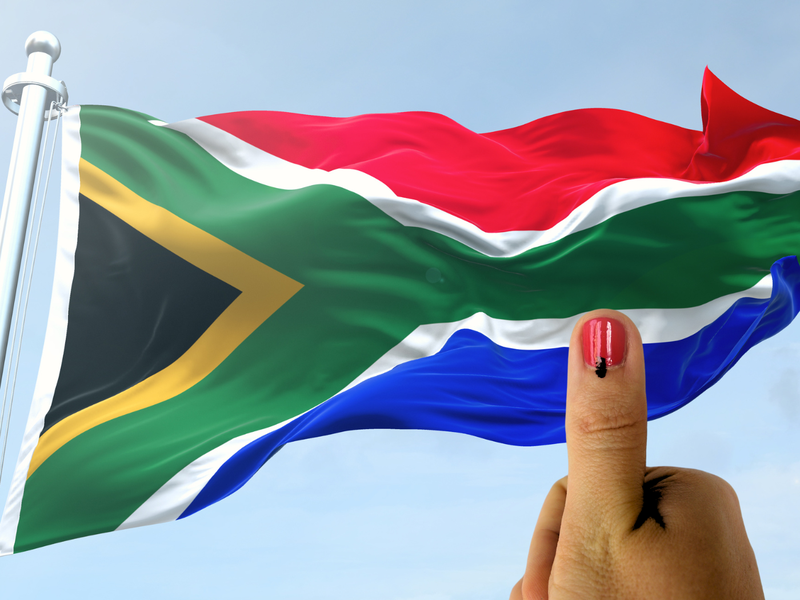SA flag and voting thumb