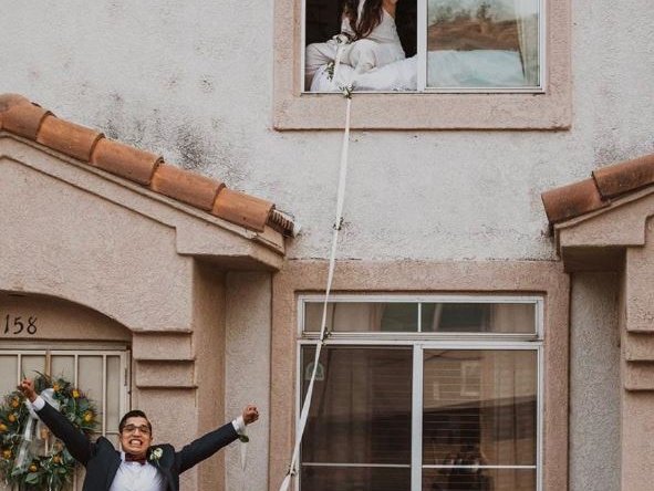 Newlyweds Say ‘I Do’ Through Window of 2-Story House After Bride Tests Positive for COVID