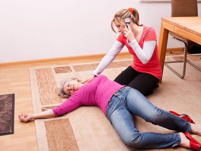 Woman collapses on the floor