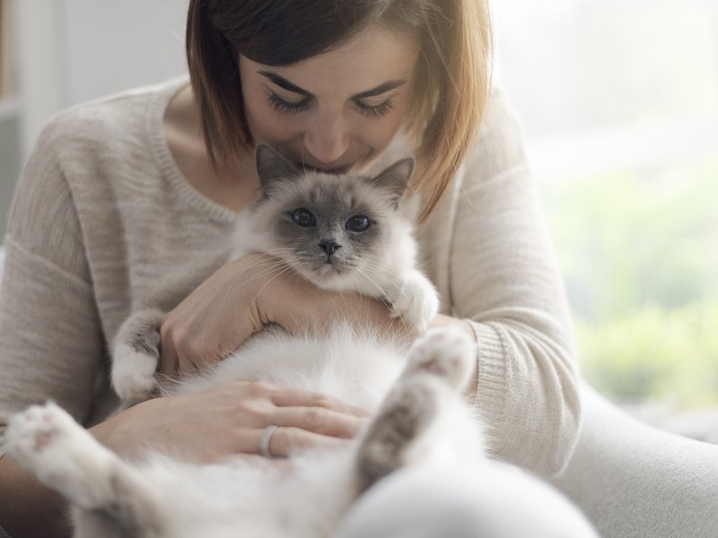 Woman holding pet