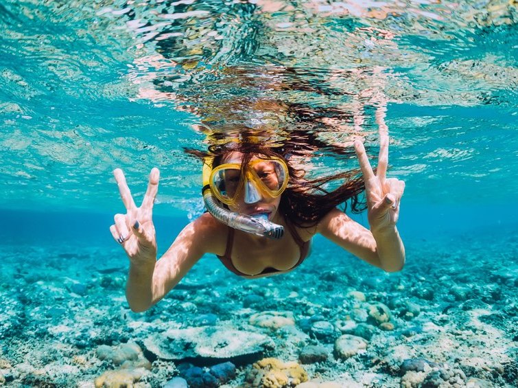 A woman snorkeling
