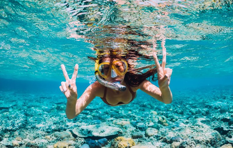 A woman snorkeling