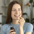 Woman taking supplements