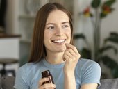 Woman taking supplements