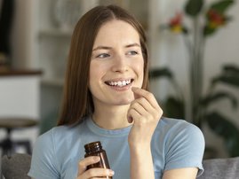 Woman taking supplements