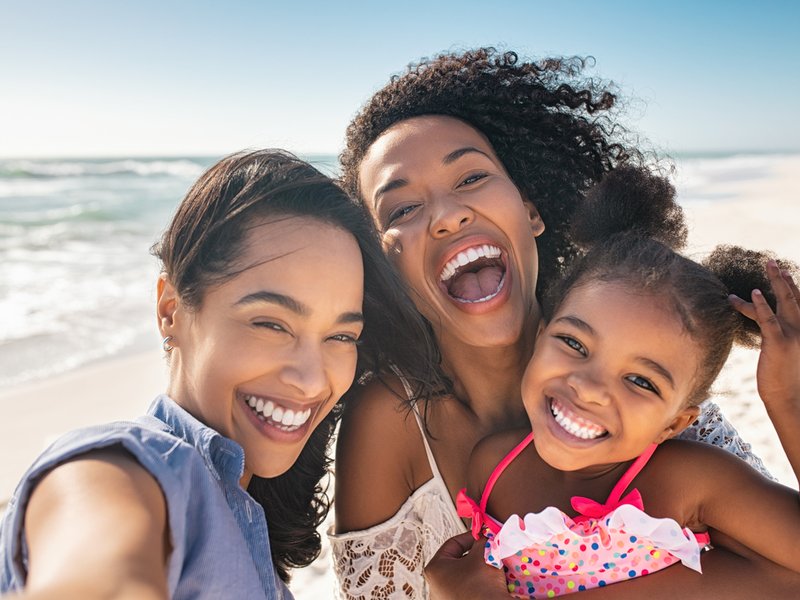 Women and child having fun