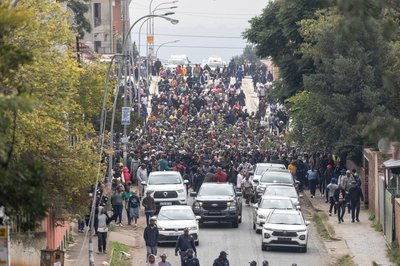 South African anti-migrant protesters march after Ramaphosa warns vigilantes