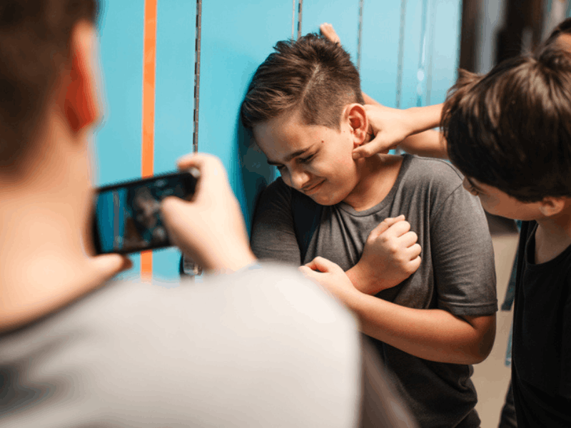 young boy being bullied at school